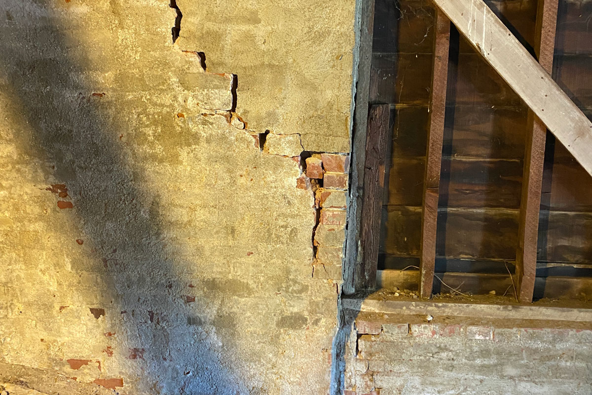 Showing cracked brick and mortar needing foundation repair in Los Angeles